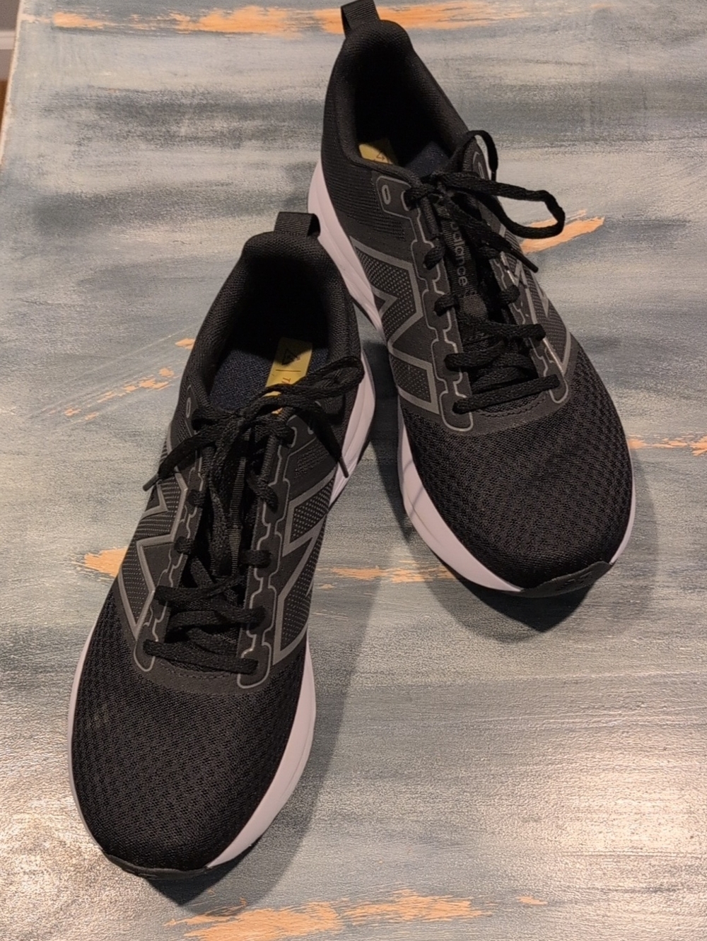New Balance Black Mesh Athletic Sneakers with White Midsole